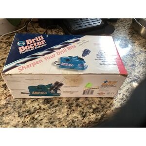 NEW Drill Doctor Model 300 Bit Sharpener w/ VHS Guide & Instruction Manual NIB
